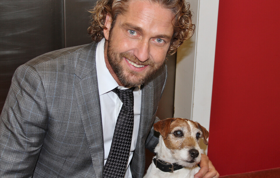 Uggie and Gerard Butler